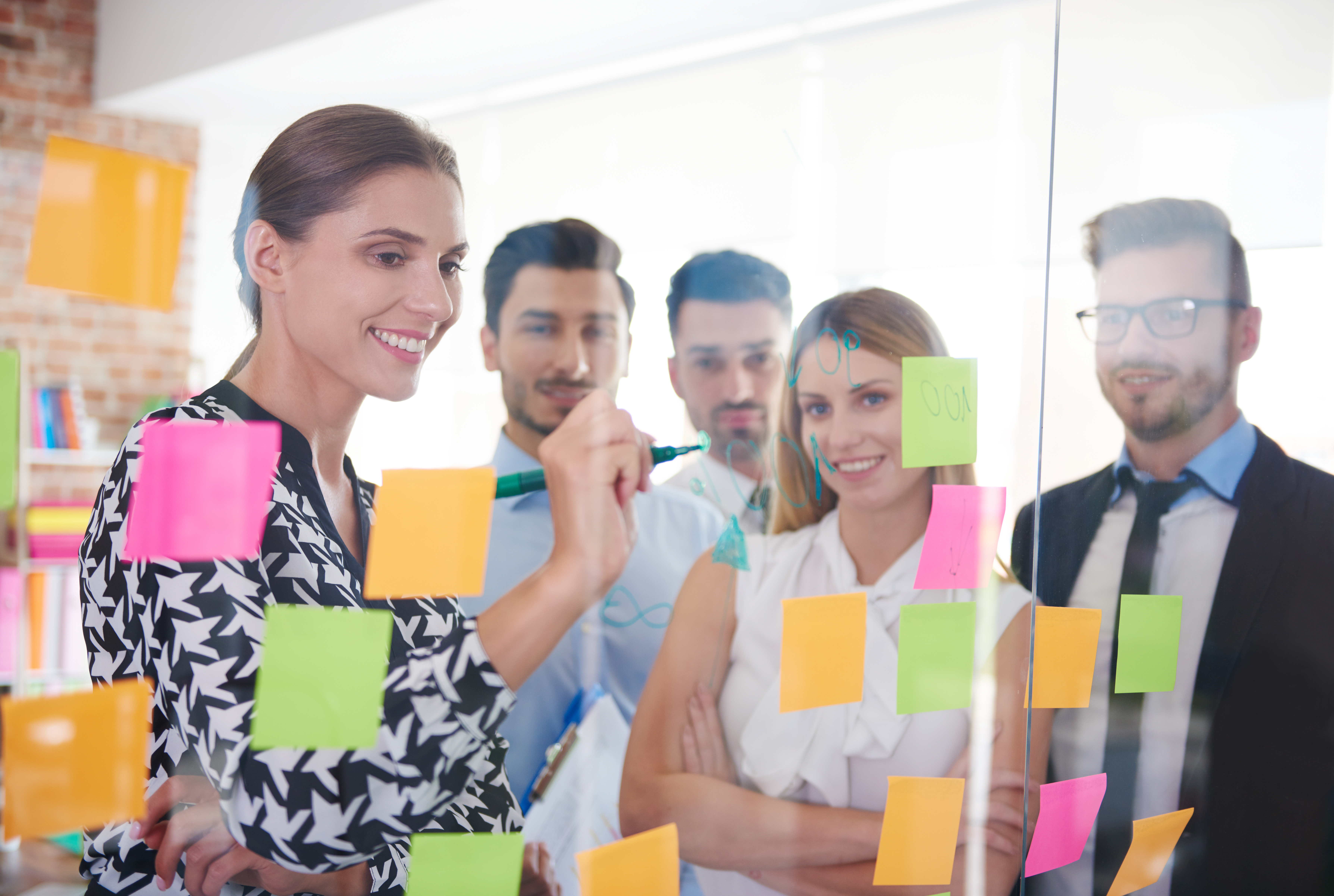 Office workers and colorful papers